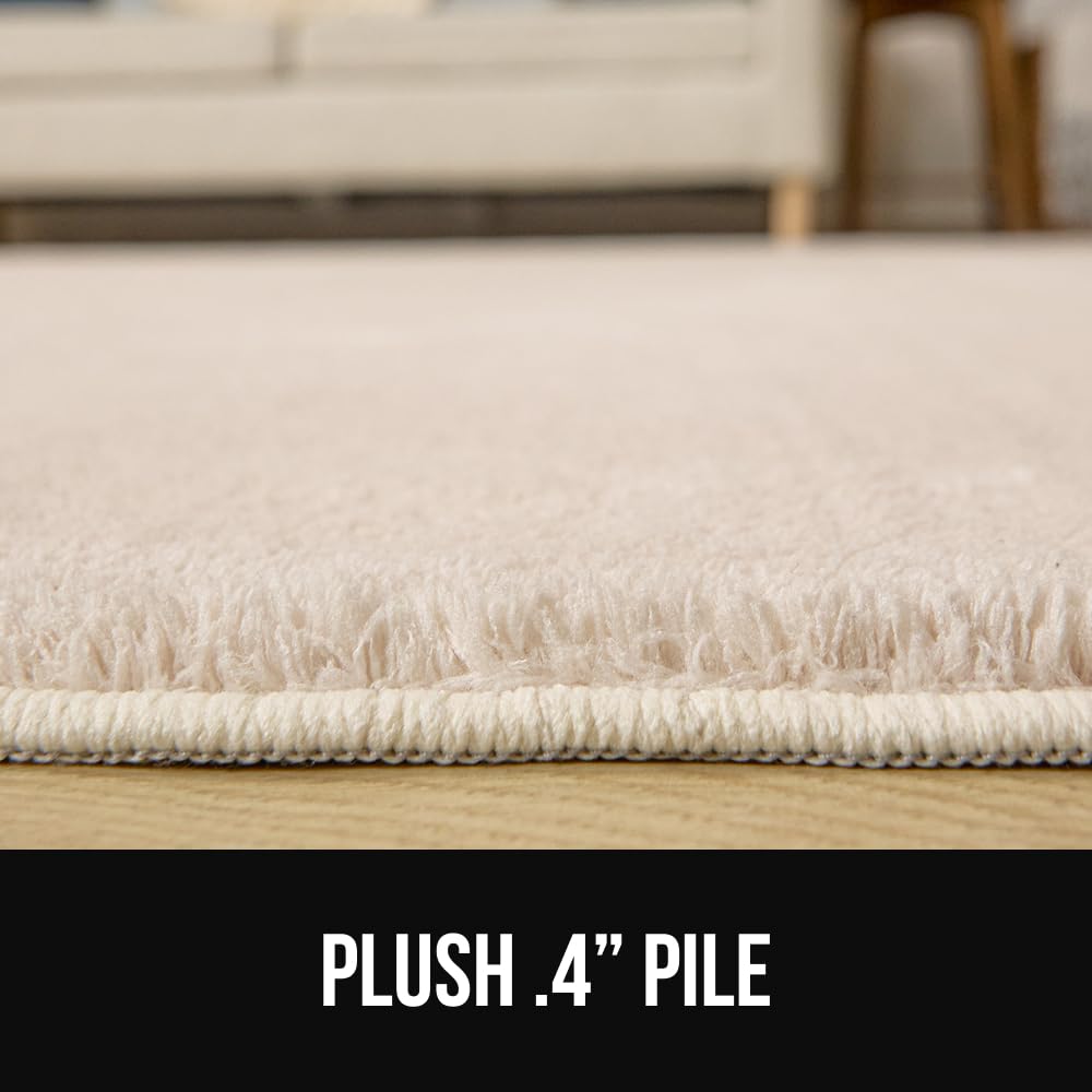 GORILLA GRIP multi-size navy rug for flexible room layouts.