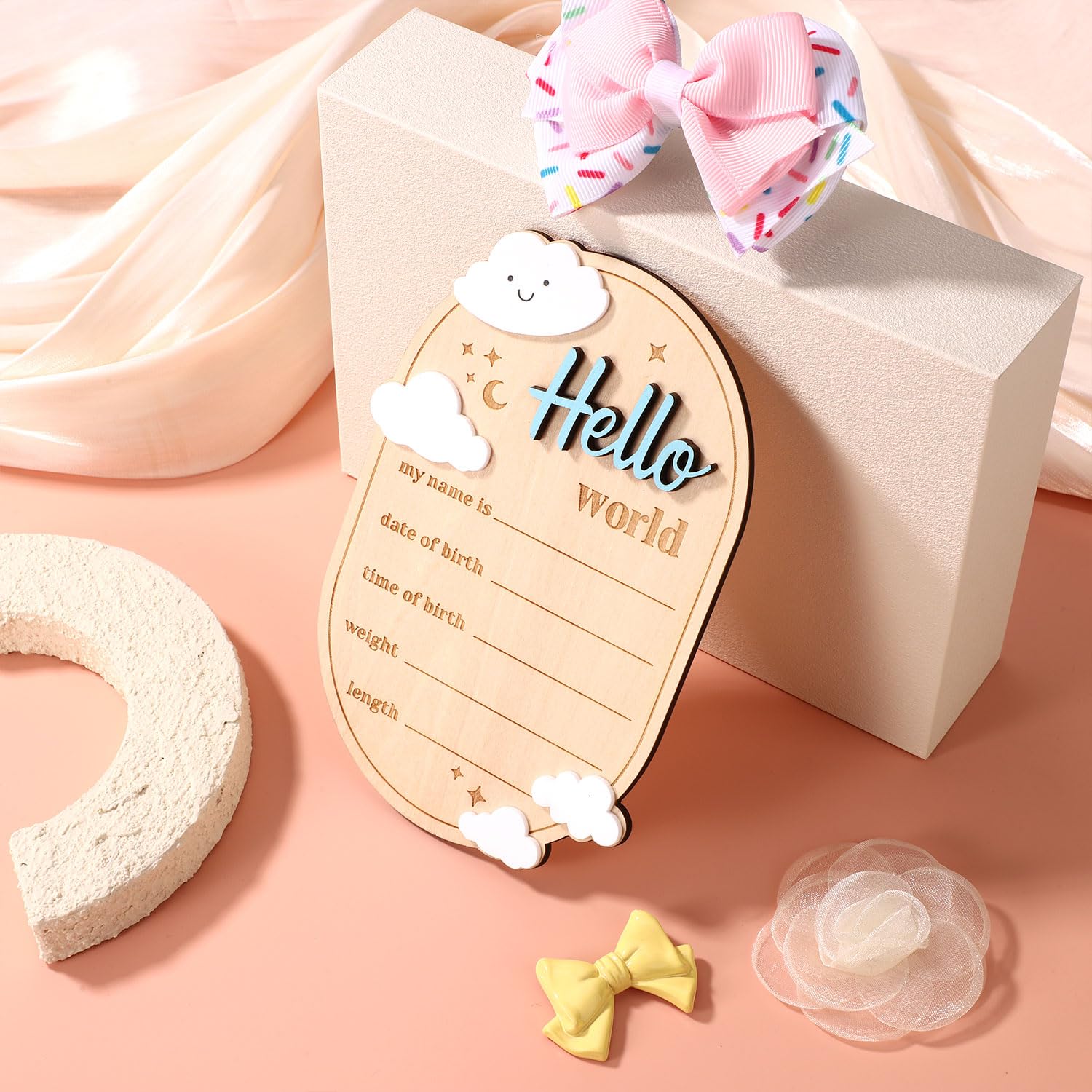 Gosknor hello world sign used as newborn photo prop in home nursery.