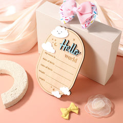 Gosknor hello world sign used as newborn photo prop in home nursery.