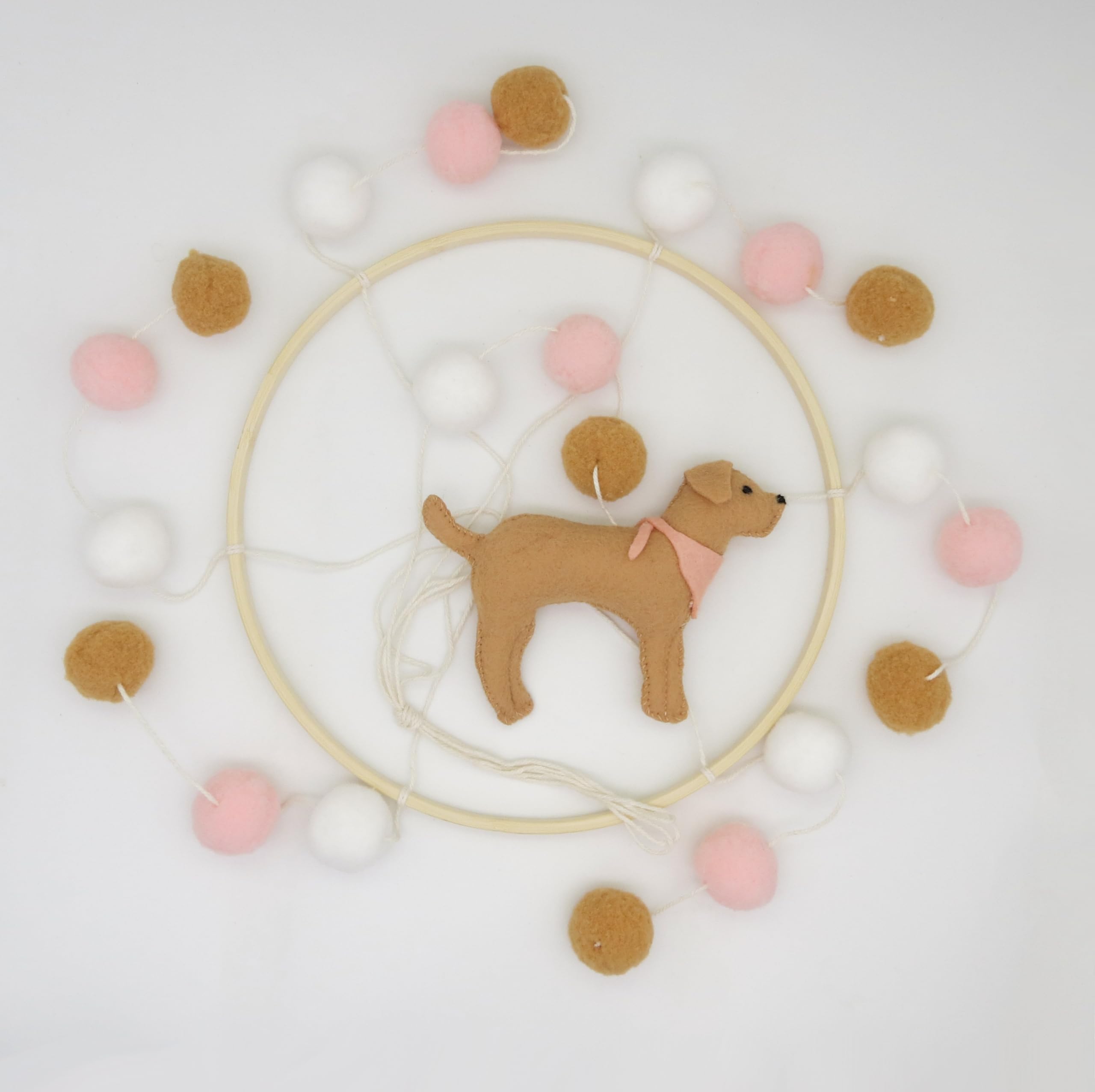 Goukurlsma bassinet mobile with felt dogs creates cozy ambiance.