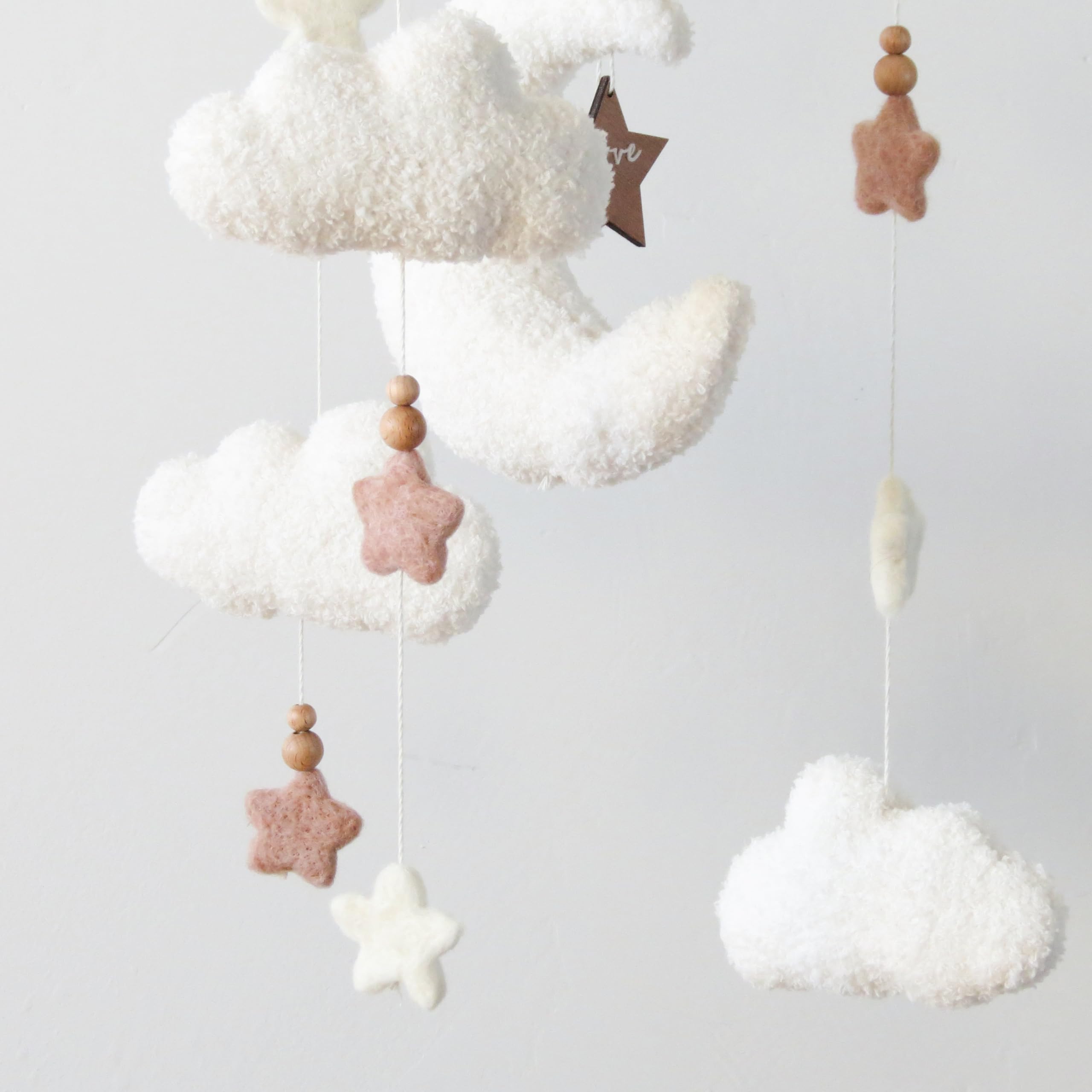 Goukurlsma ceiling hanging setup image showing adaptable height for a cozy crib arm