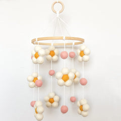 Goukurlsma Daisy Mobile with wood ring calms babies with gentle motion and visual appeal.