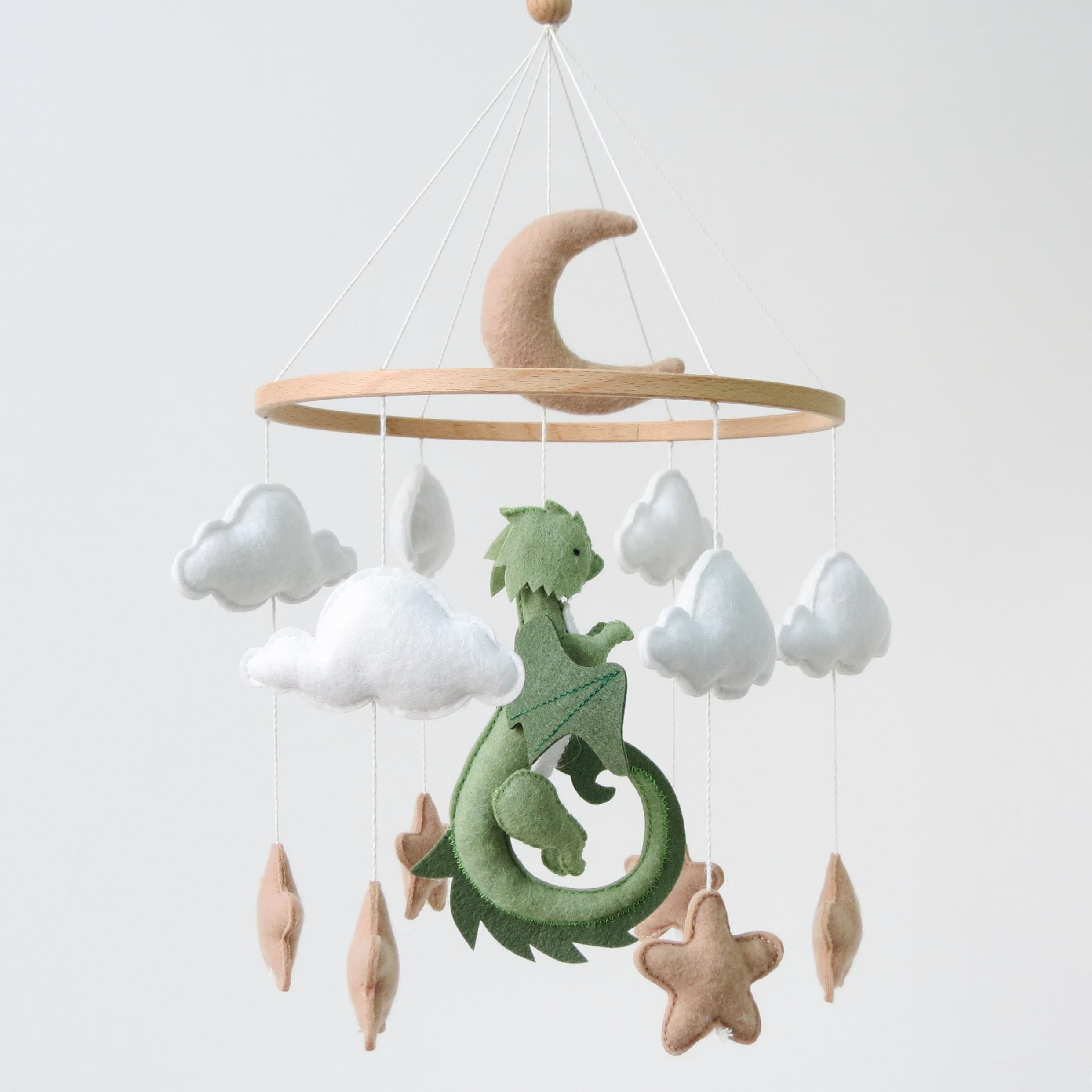 Goukurlsma dragon mobile for crib featuring dragons, clouds, and stars to spark visual development.