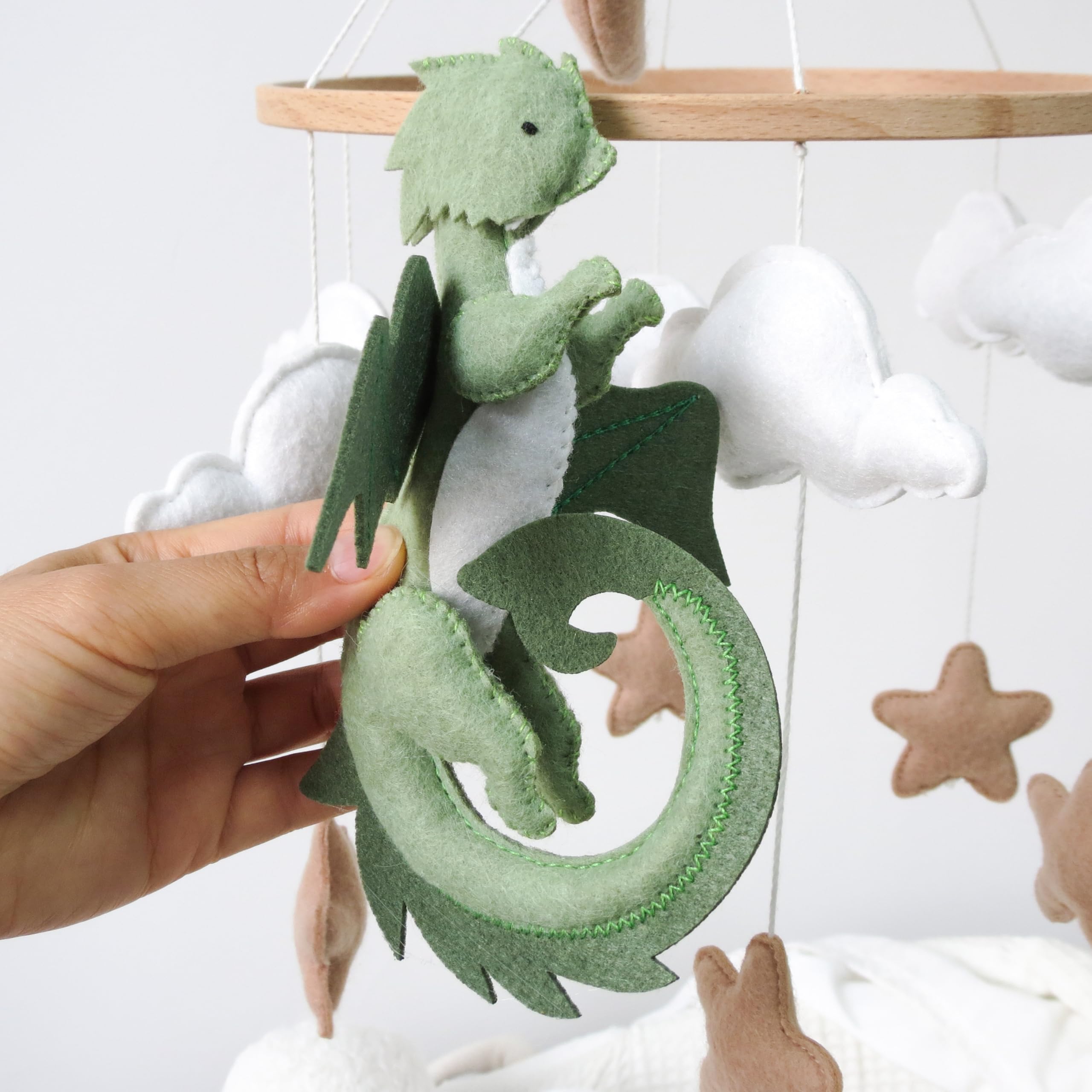 Goukurlsma dragon mobile in premium wool blend felt offers soft textures for durable nursery decor.