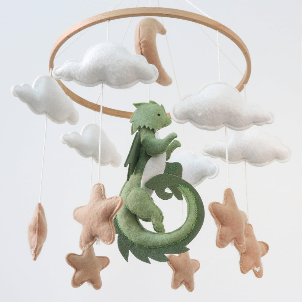 Goukurlsma dragon mobile adds yellow stars for gentle color pops during playtime and naps.