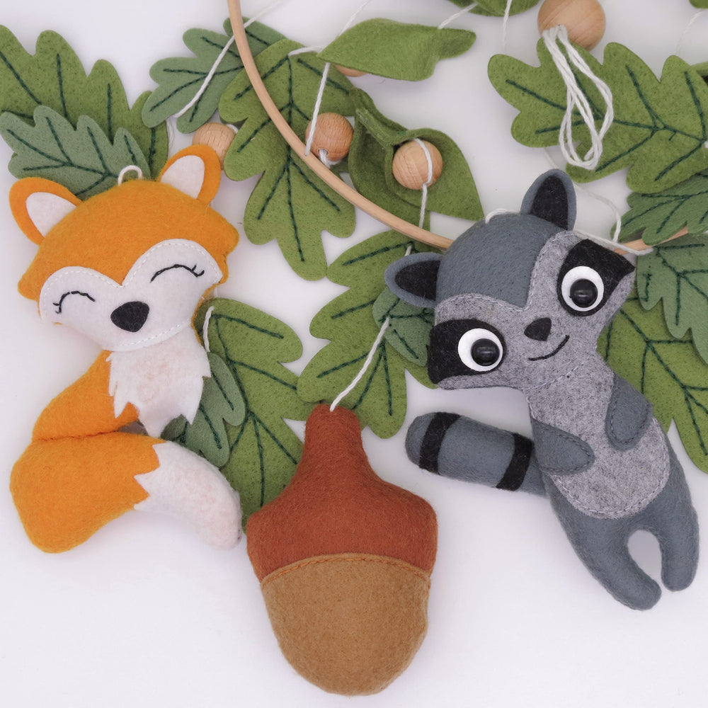 Goukurlsma woodland crib mobile makes a charming newborn gift.