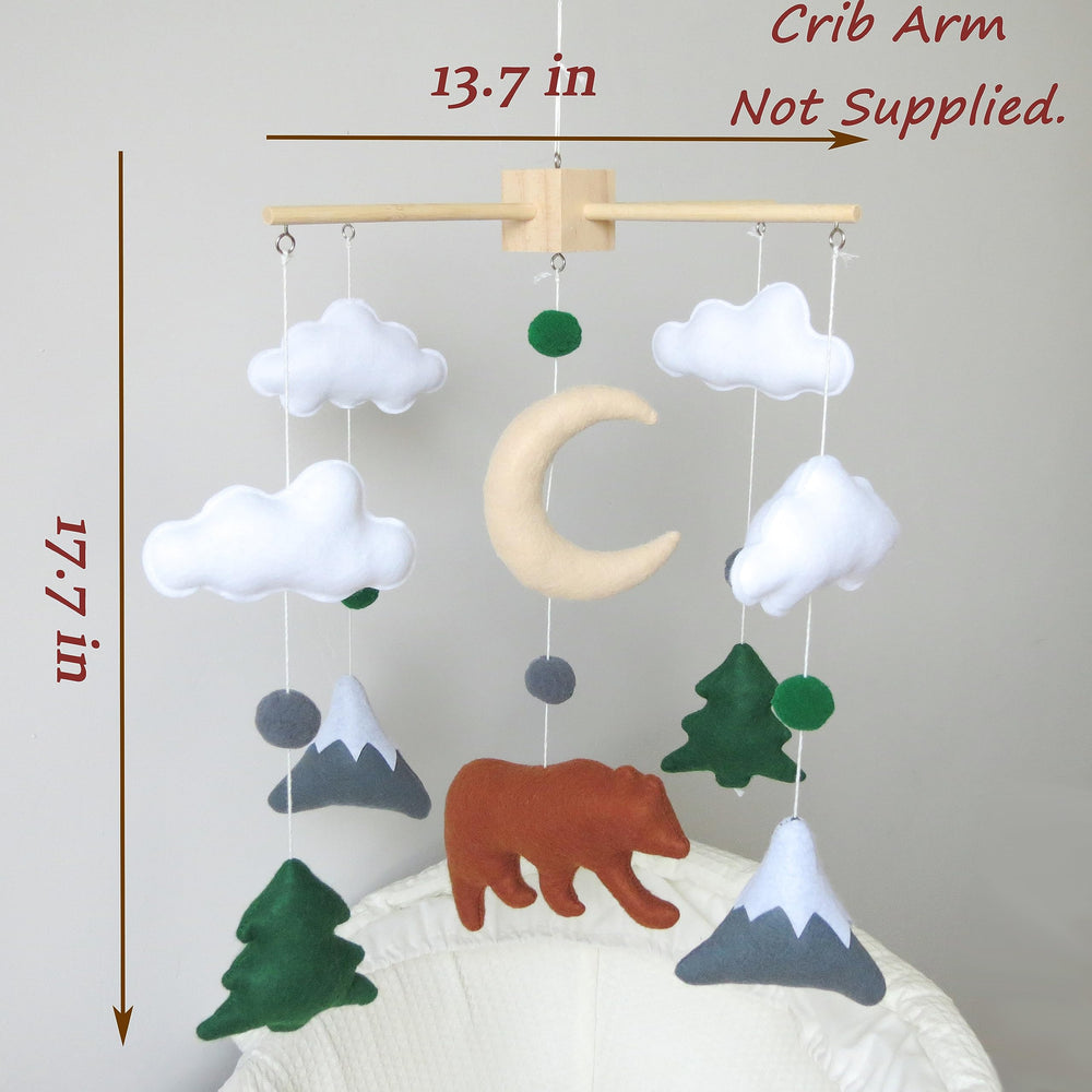 Goukurlsma woodland mobile moon and clouds helps soothe baby during naptime.
