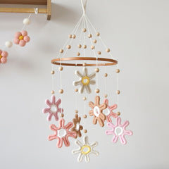 Goukurlsma Woven Daisy Mobile for Crib showcases natural craft for a calming nursery.