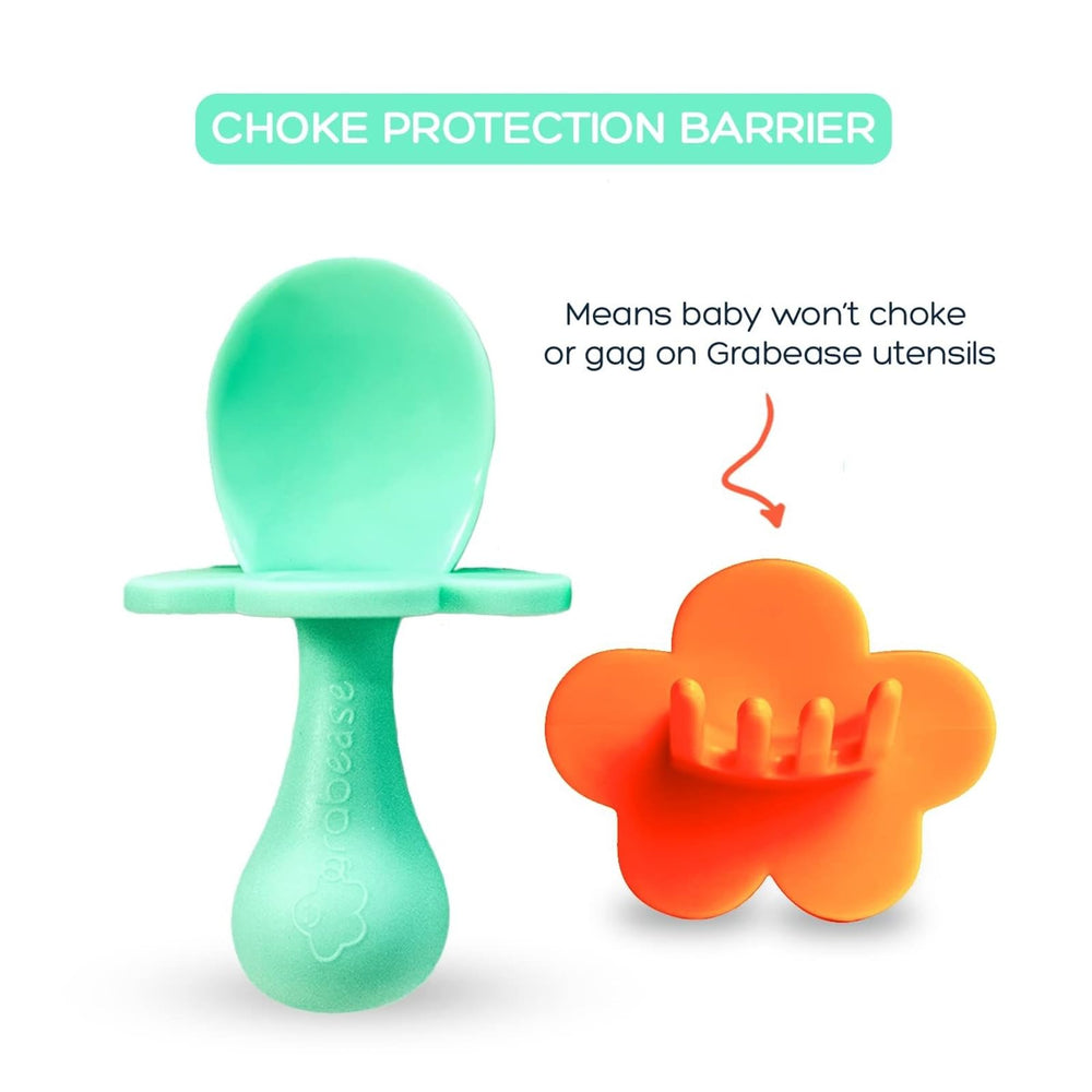 Safety barrier design on Grabease utensils aids choking-conscious feeding.