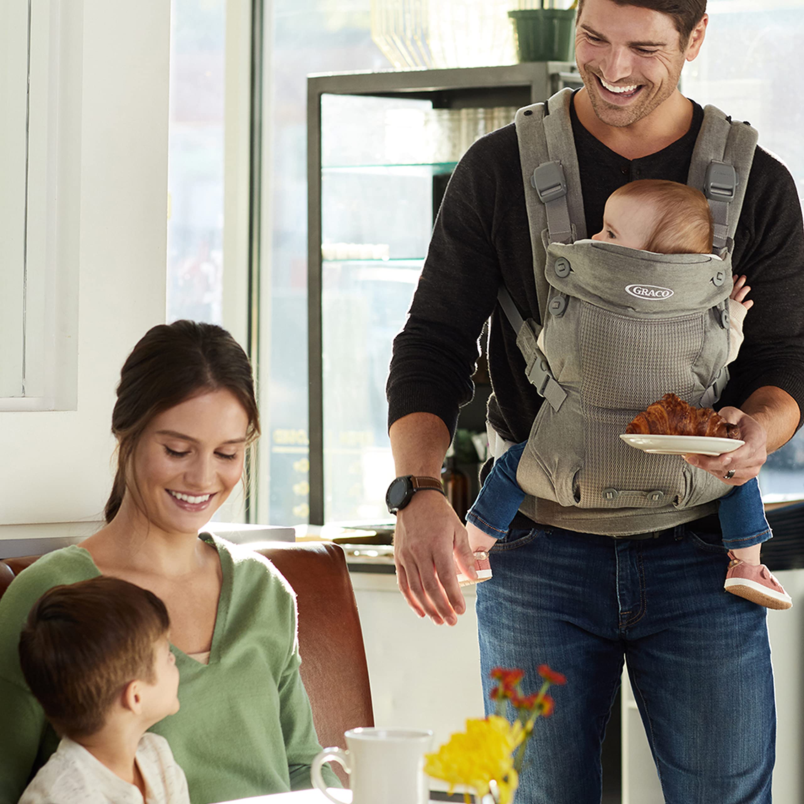 Graco Cradle Me 4-in-1 organic bibs included for easy clean-up.