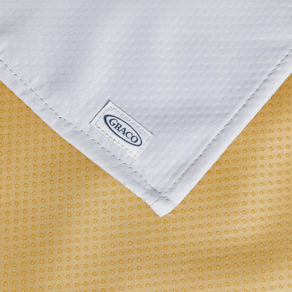 Graco splat mat is machine washable for quick cleanup.