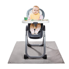 Graco splat mat under high chair protects floors from spills and messes.
