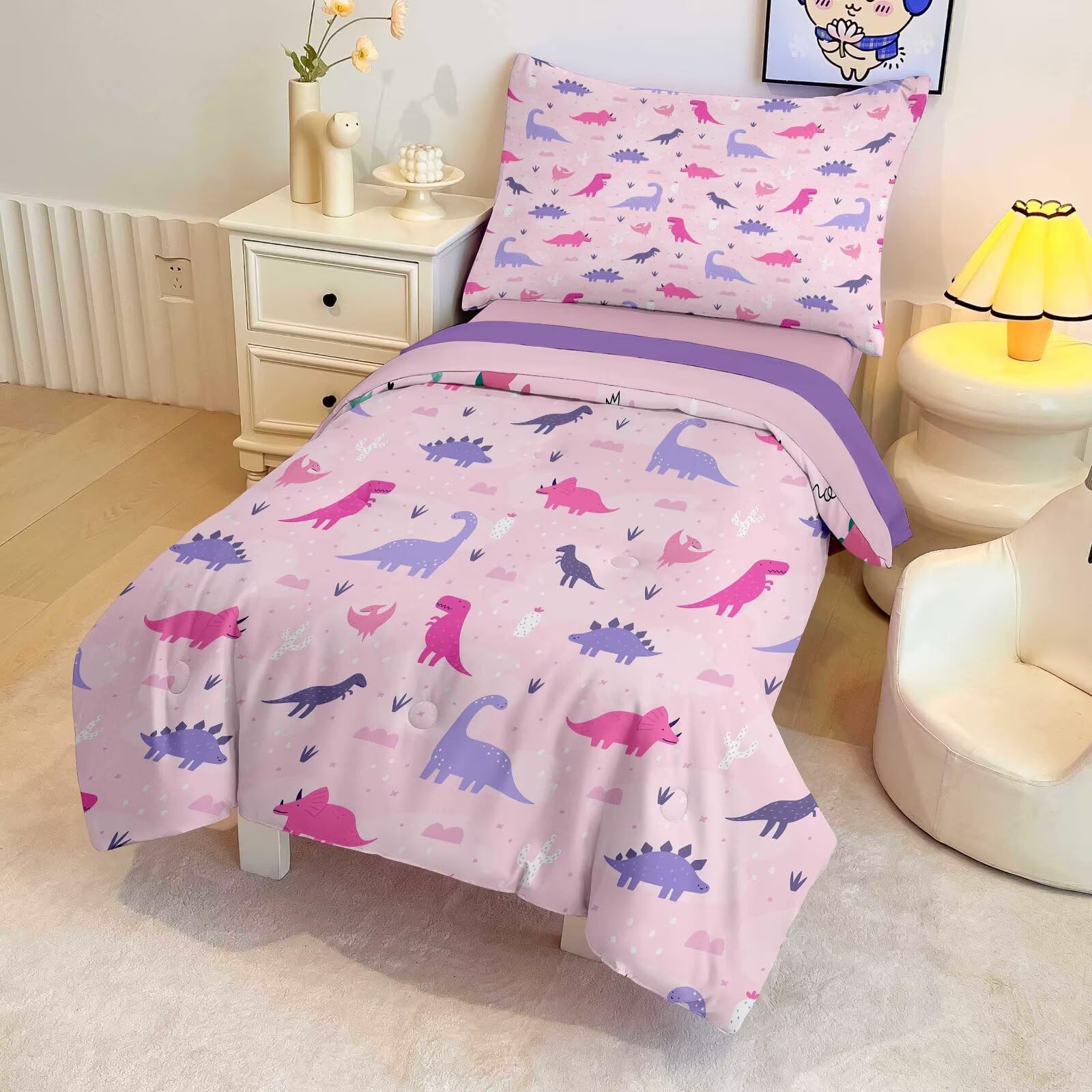 GRAT TIOC pink dinosaur fitted sheet with elastic pocket stays secure.