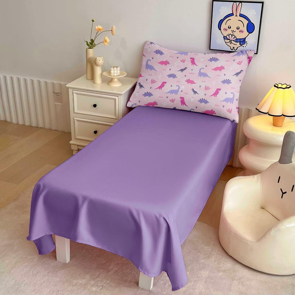 GRAT TIOC dinosaur bedding arranged in a cozy toddler room for bedtime comfort.