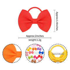 Close-up of green grosgrain bows with elastic ties for stable styling.