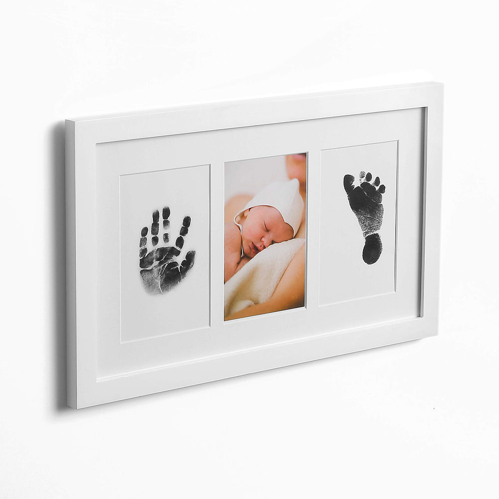 Green Pollywog newborn footprint impression; inkless capture.