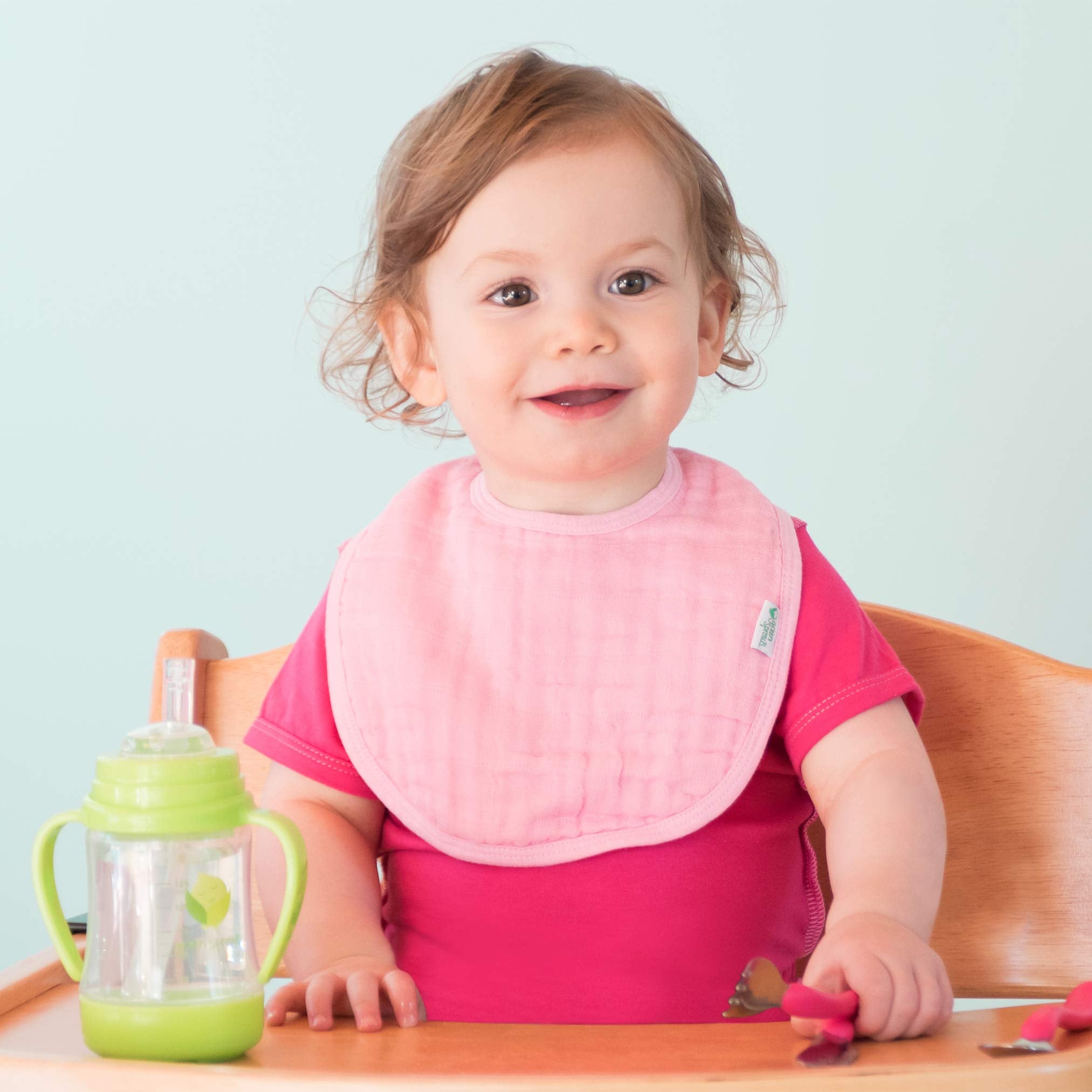 Green Sprouts adjustable snap closure bib grows with baby for a secure fit