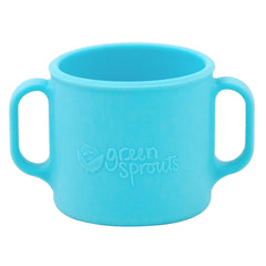 Green Sprouts Learning Cup with easy-grip handles for independent sipping.