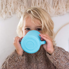 Learning Cup features a wide base for stable use during drinks.