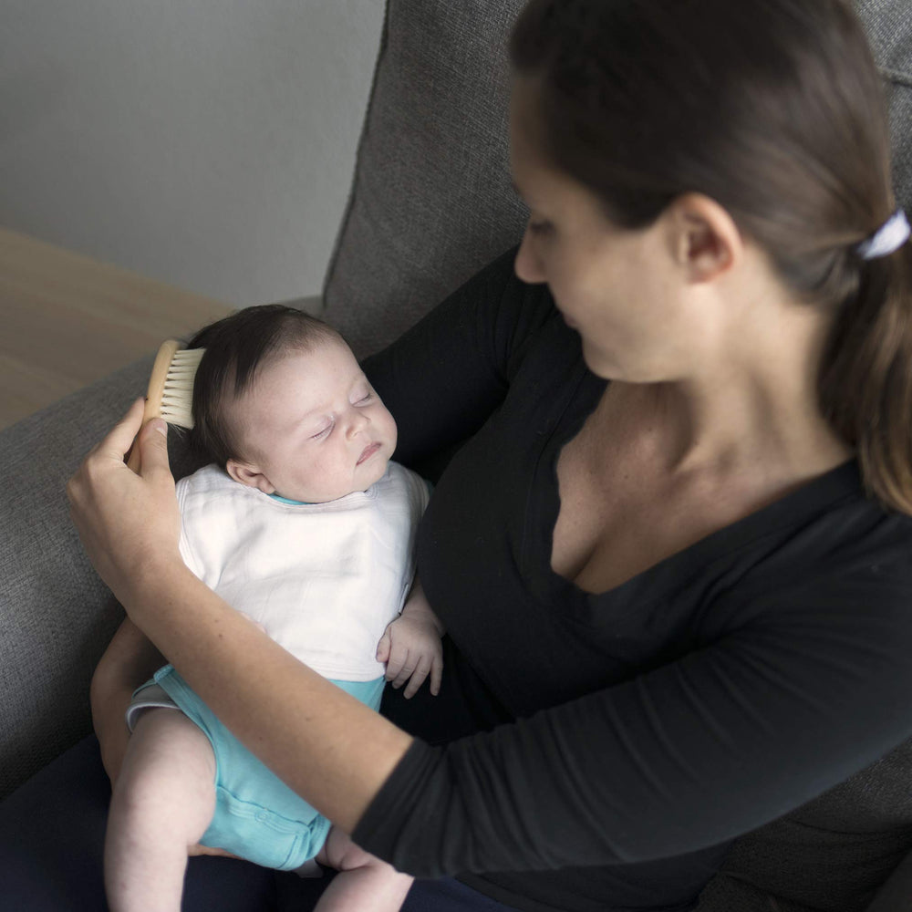 Green Sprouts bibs for 0-12 months with soft, breathable fabric.