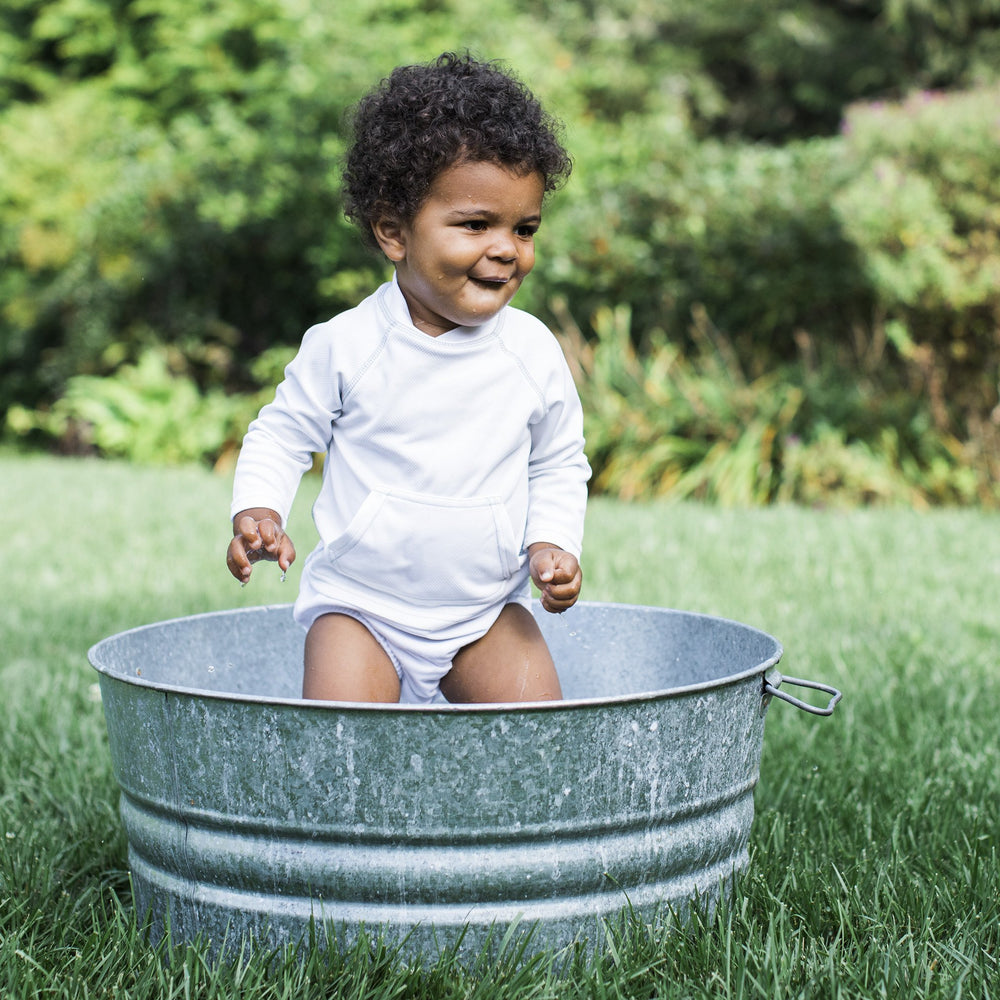 Green Sprouts swim diaper with side snaps for quick changes.