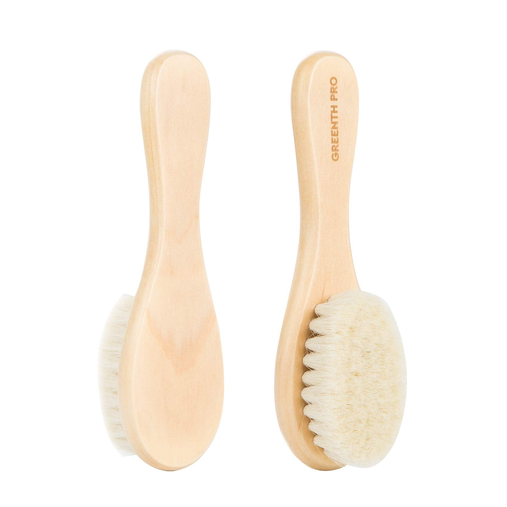 Close-up of GREENTH PRO goat hair bristles gliding through soft baby hair