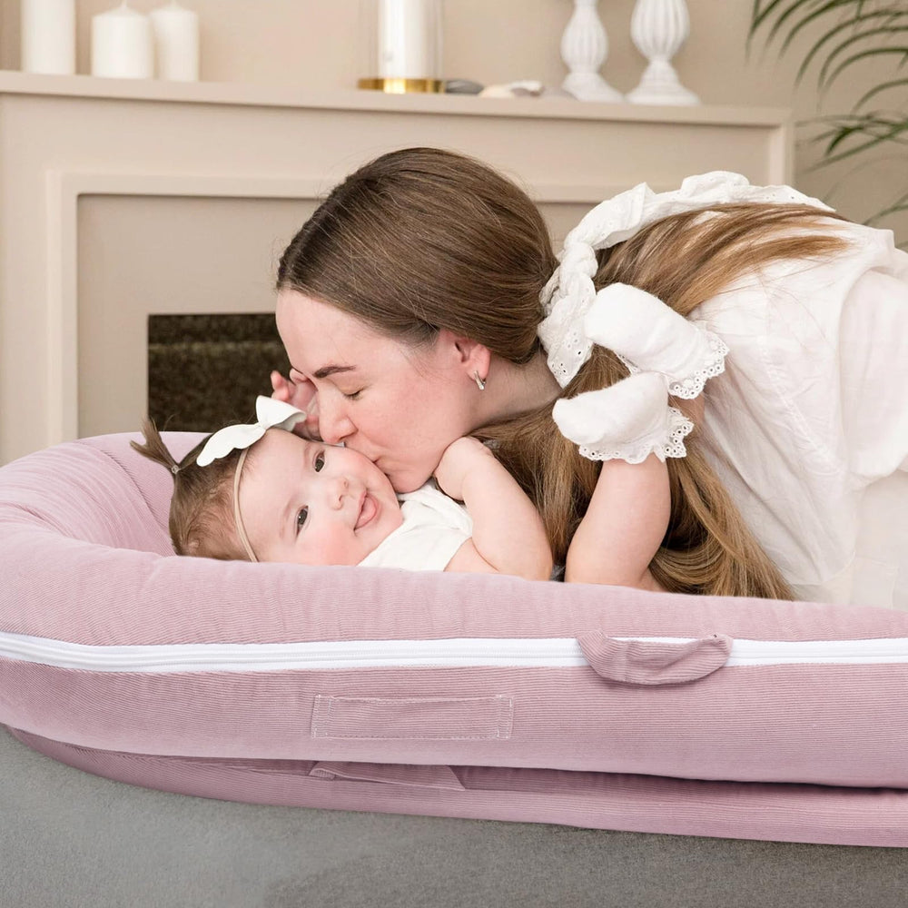 Greuame Nest Lounger Cover pink in-use shot conveys cozy lounging