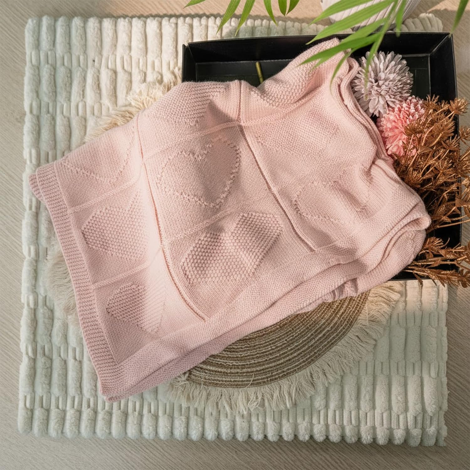 Grewear all-season blanket provides warmth for a 30x40 baby space.