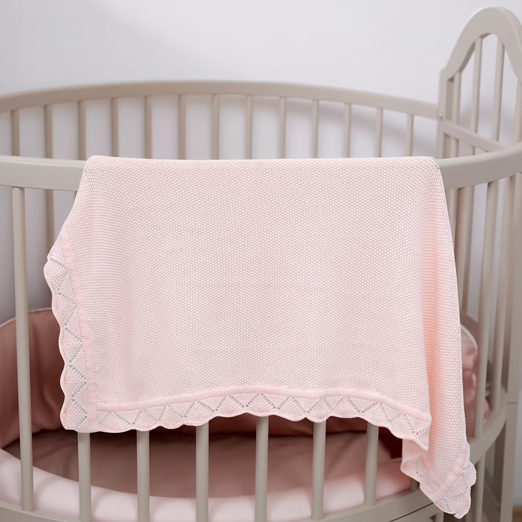 Grewear baby blanket swaddled on a newborn for calm sleep