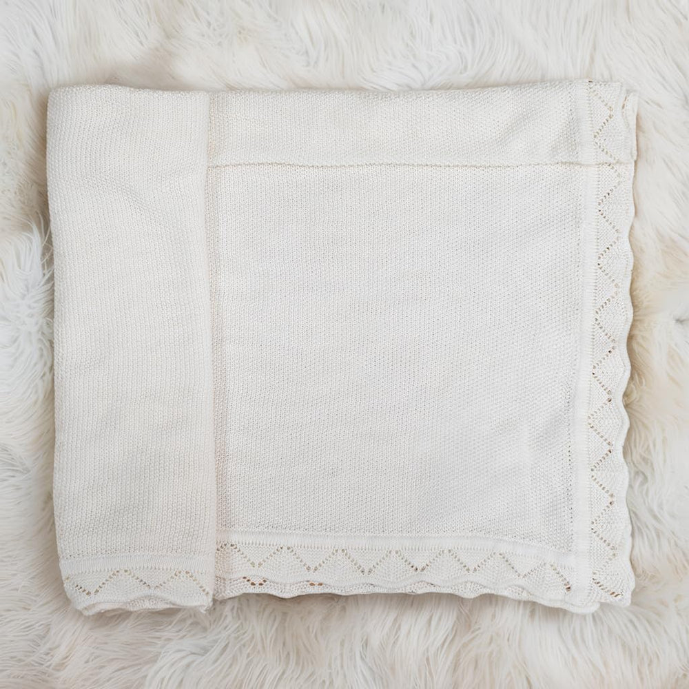 Grewear blanket used during crib naps for comforting warmth.