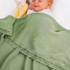 Grewear Baby Knit Blanket with scallop border offering breathable cotton for year-round softness.
