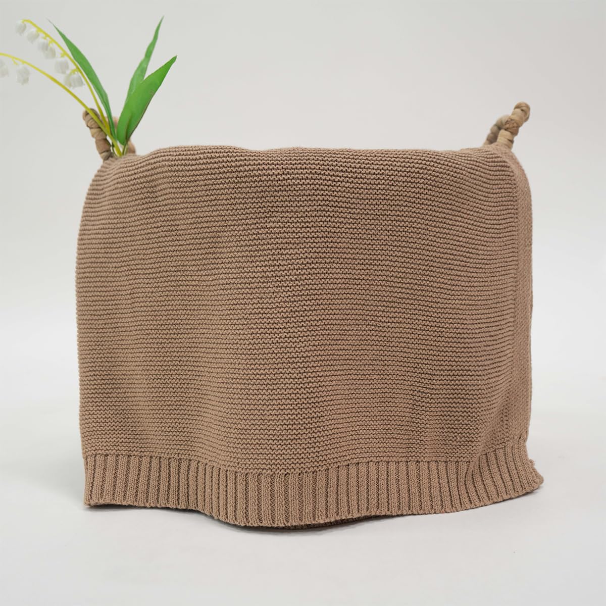 Grewear baby knit blanket in mocha cotton for year-round comfort.