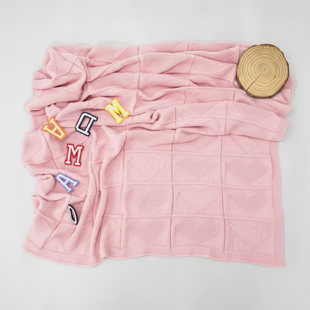 Grewear baby knit cotton blanket with pink heart design, ideal as stroller cover for on-the-go comfort.