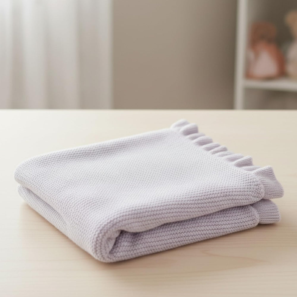 Grewear breathable knit baby blanket keeps your child cozy without overheating.