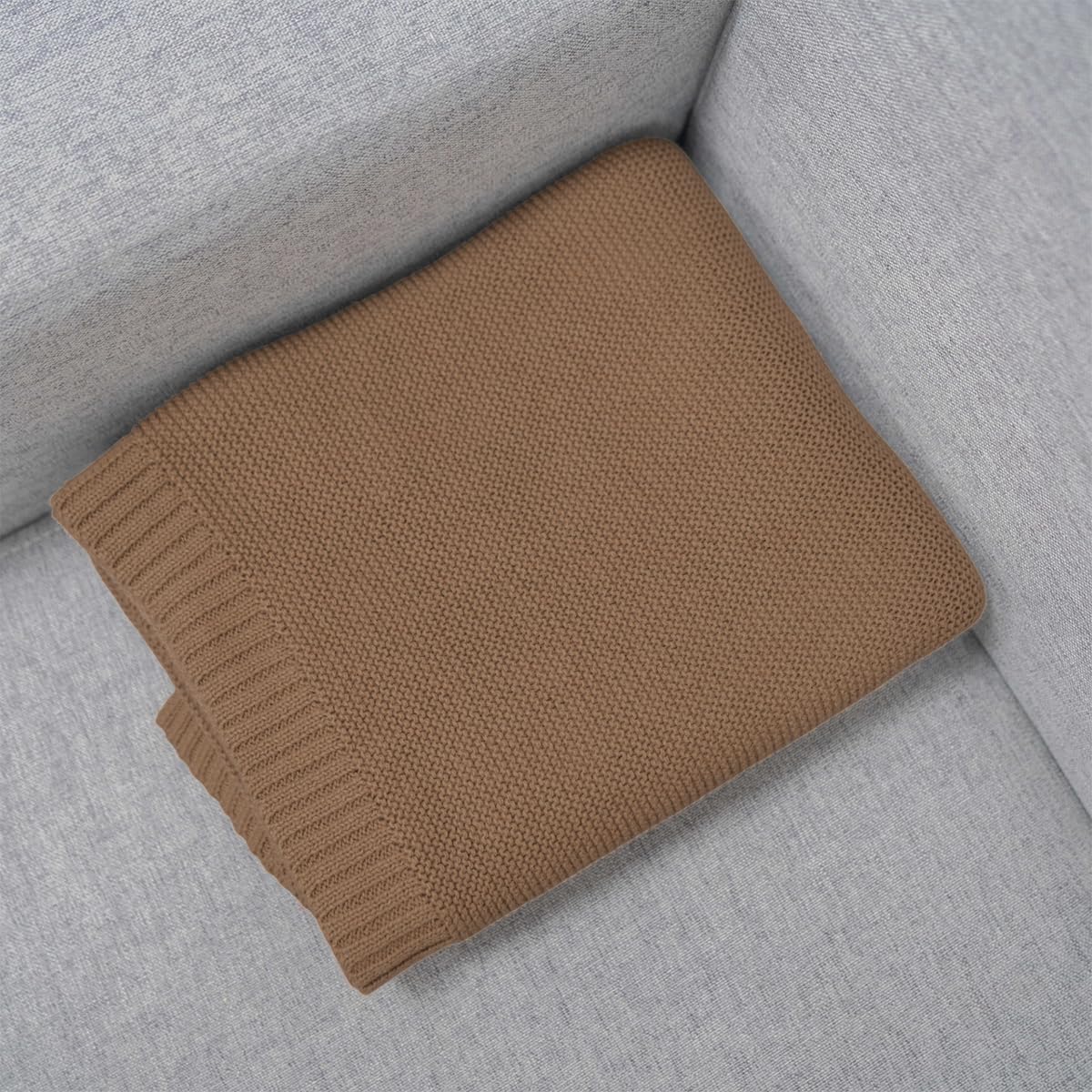 Grewear nursing blanket knit provides lightweight warmth during feeds.