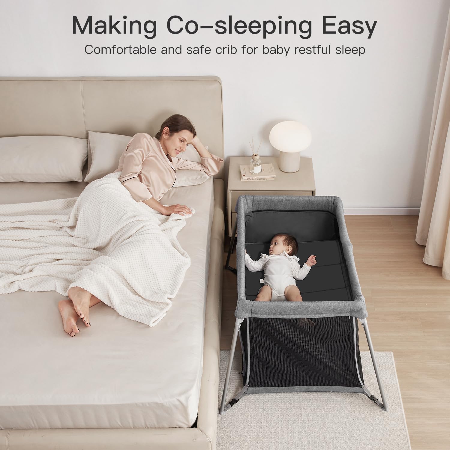 Gromast 2-in-1 travel crib with mesh sides for ventilation and safe viewing.