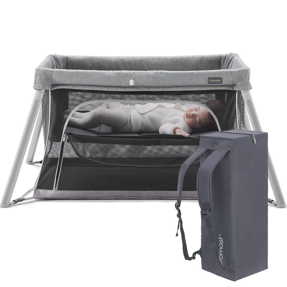 Gromast 2-in-1 travel crib setup shows stable base for safe baby play.