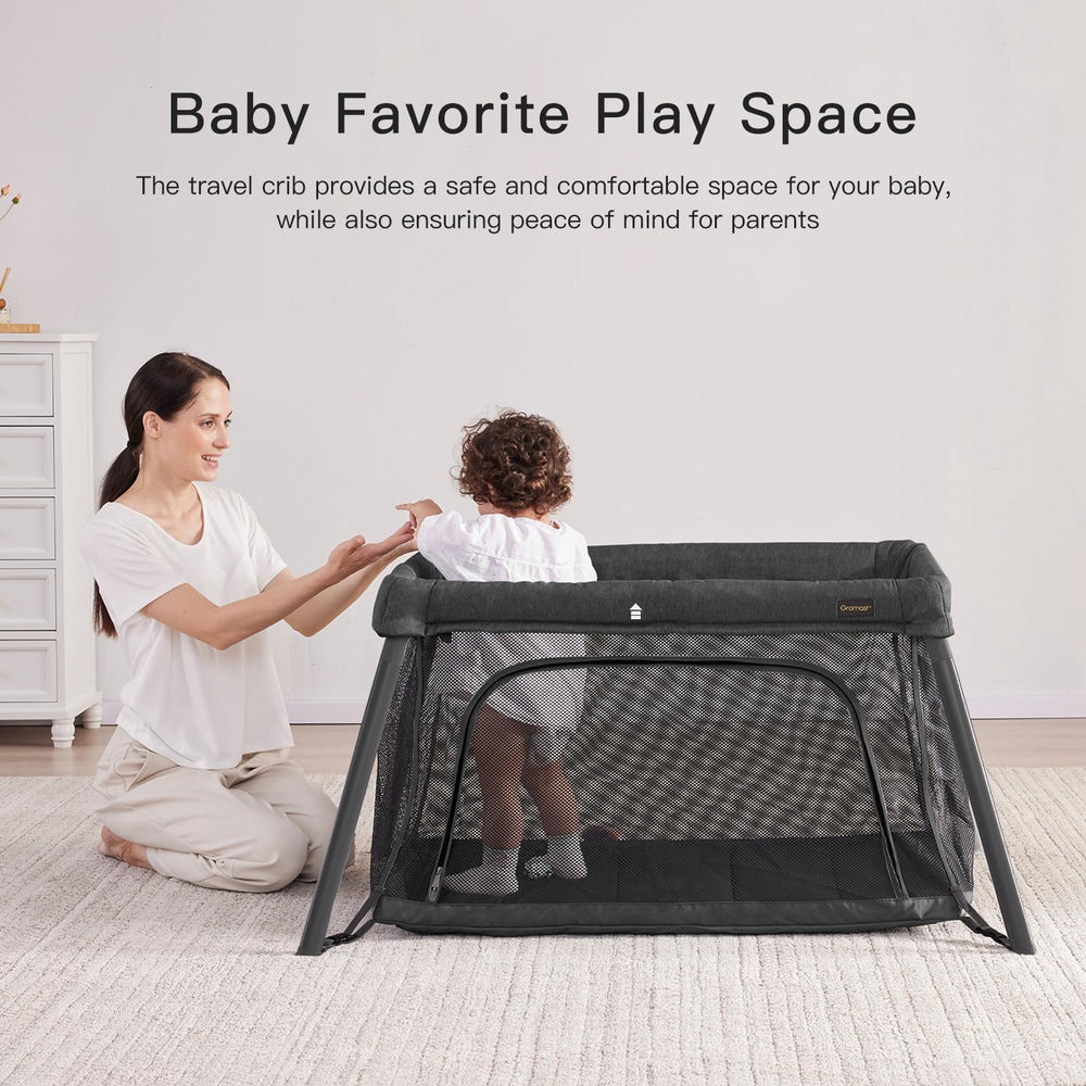 Gromast baby inside the travel crib during travel and play.