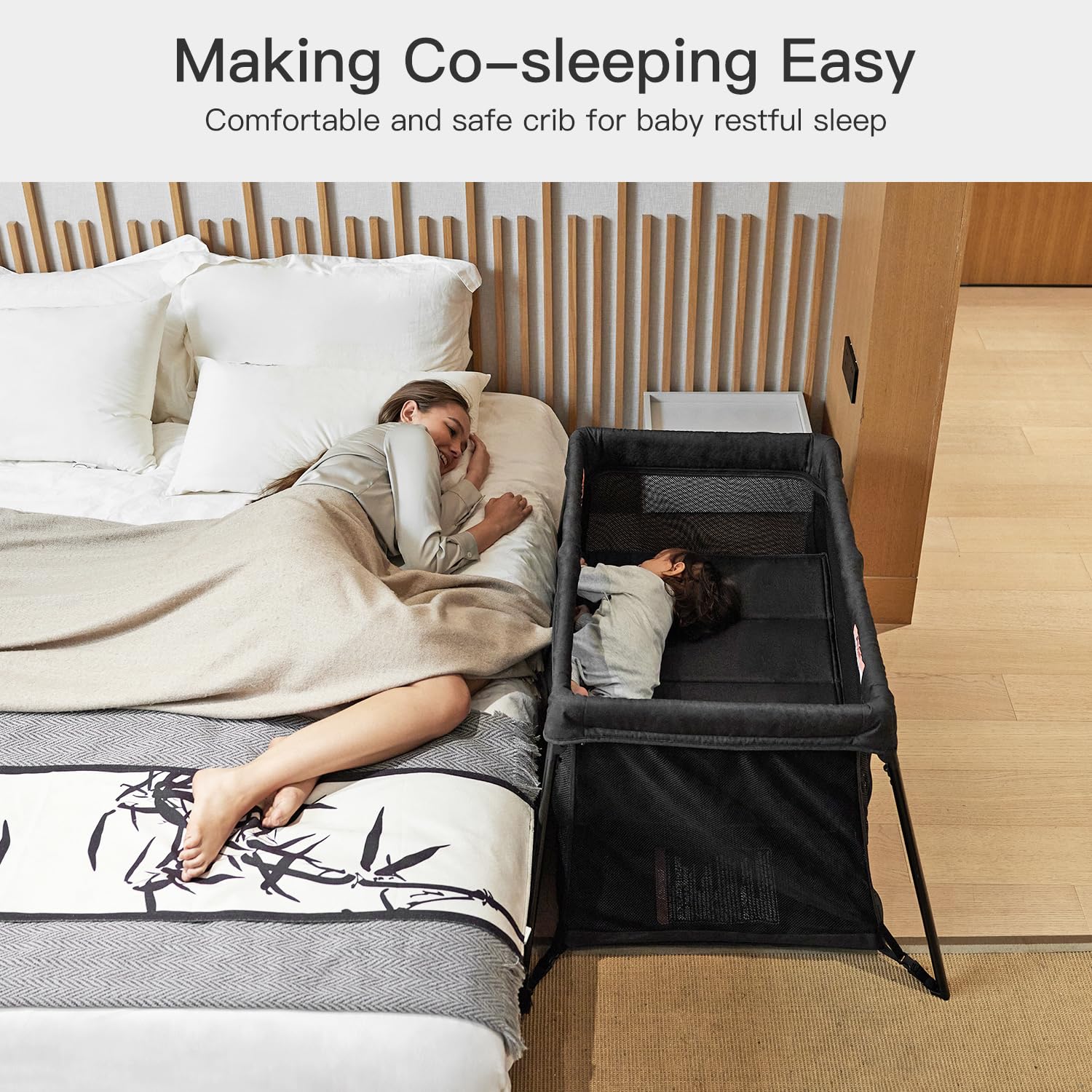 Gromast mesh-side travel crib provides ventilation and visibility.