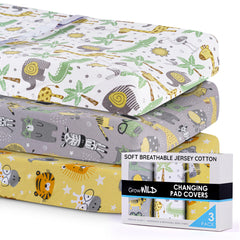 Grow Wild changing pad cover demonstrating snug fit on standard rectangular pads.
