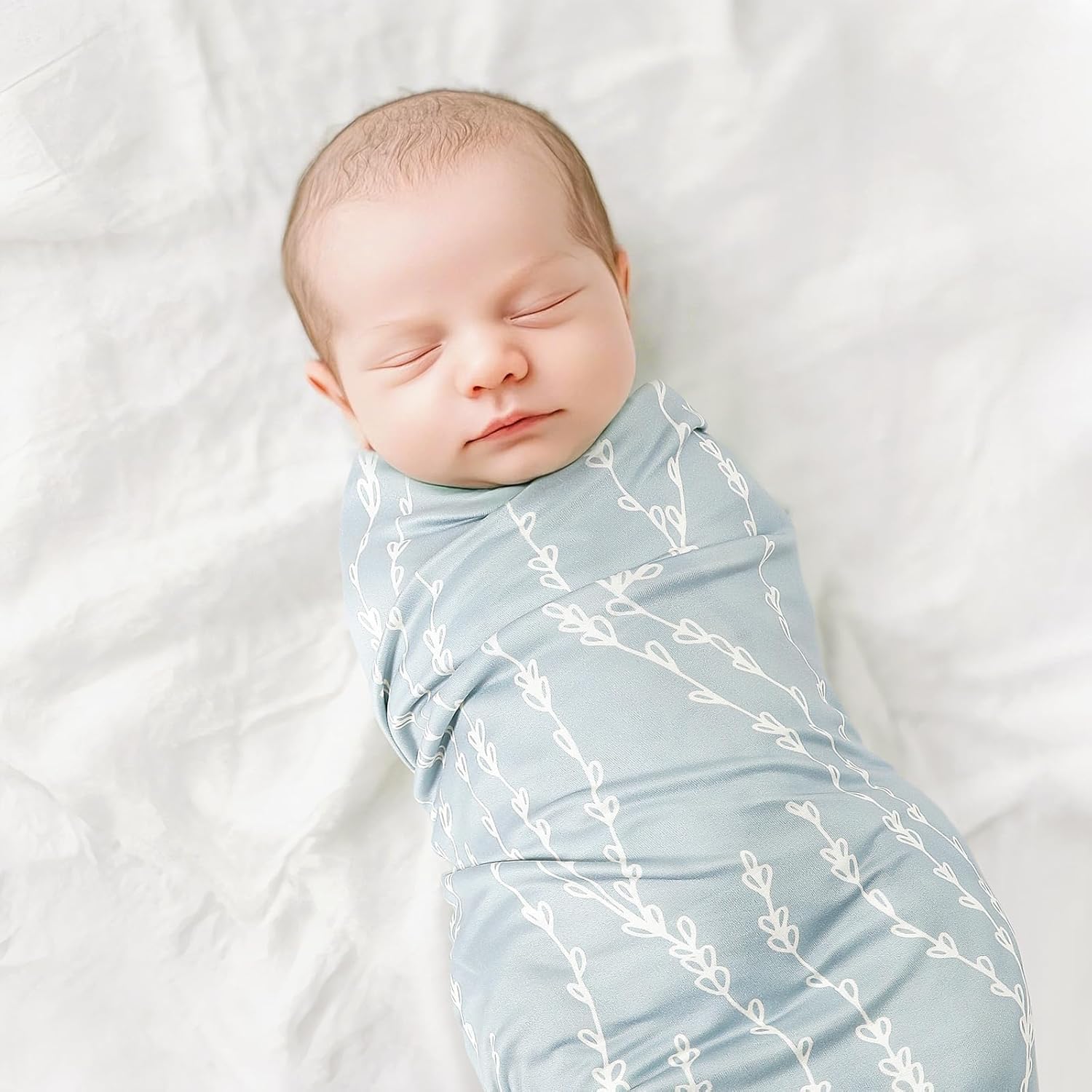 GRSSDER 34x44 swaddle blanket flat lay highlighting generous size for swaddling or mat.