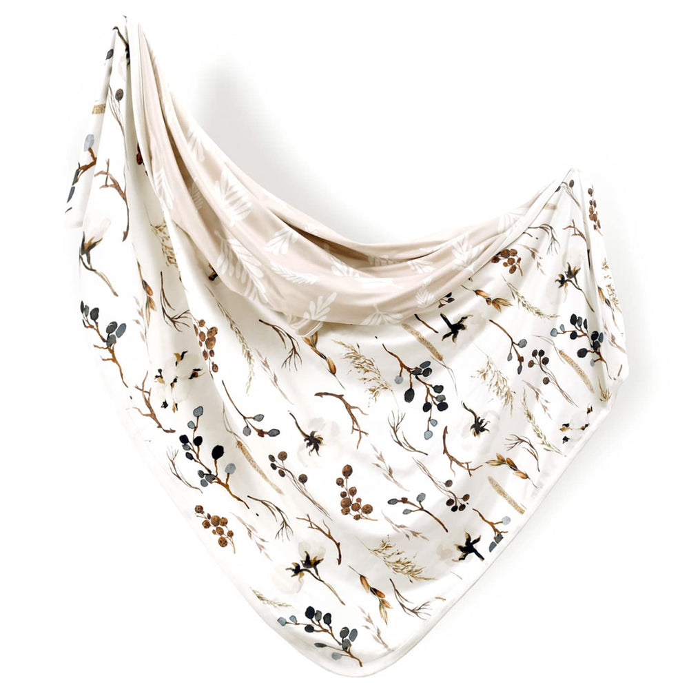 GRSSDER Flora beige baby blanket with double-layer warmth for swaddling and cozy naps.