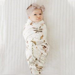 GRSSDER 34x44 blanket serves as a roomy swaddle and cozy play mat