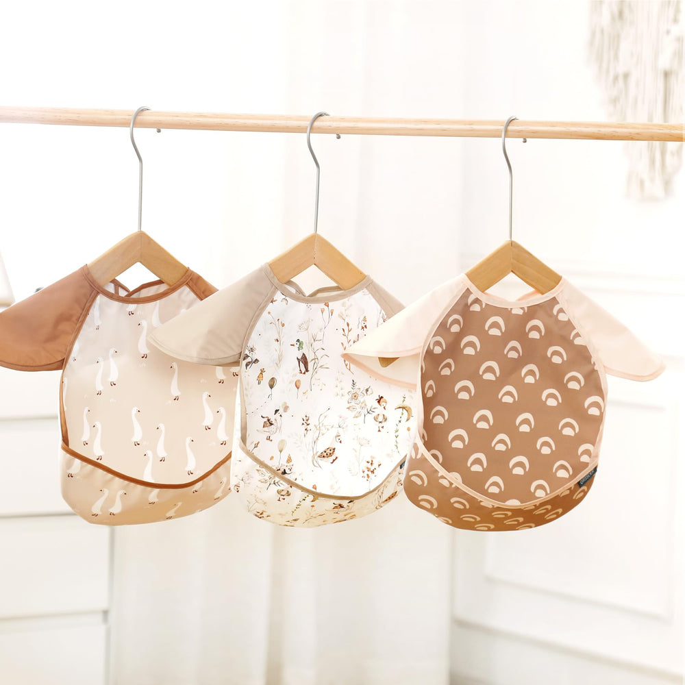 GRSSDER bibs gift-ready packaging signals thoughtful nursery accessory