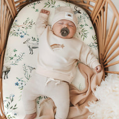 GRSSDER elastic-bottom bassinet cover stays securely in place for quick changes.