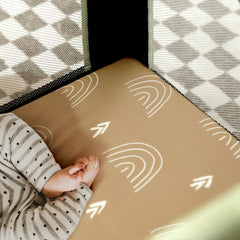 GRSSDER elastic-edge on pack-n-play sheet secures a snug fit.
