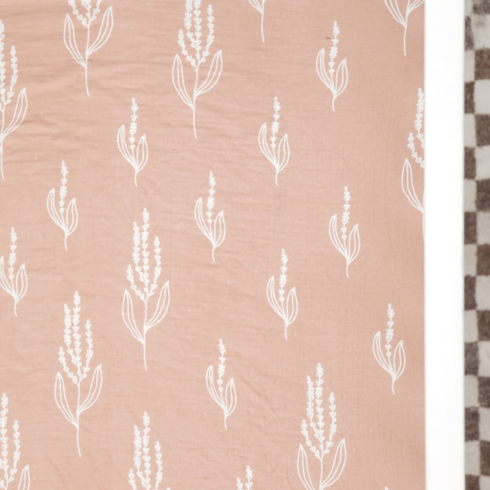 GRSSDER crib sheet fitted on mattress demonstrates snug fit and 9-inch pocket
