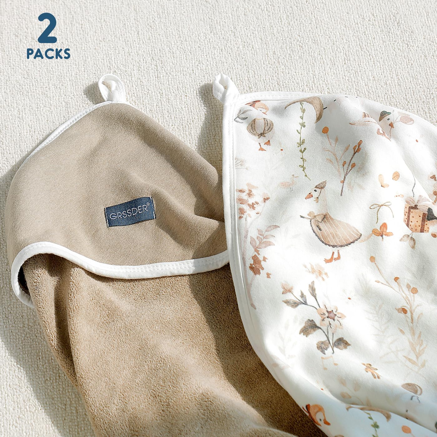 GRSSDER infant hooded towel used during bath time for hug-like warmth.
