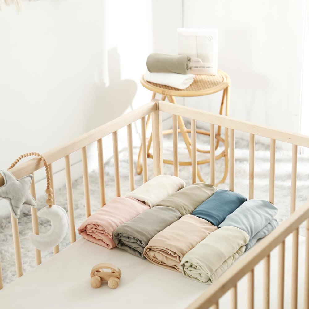 GRSSDER breathable-jersey crib sheet helps regulate baby comfort during sleep.