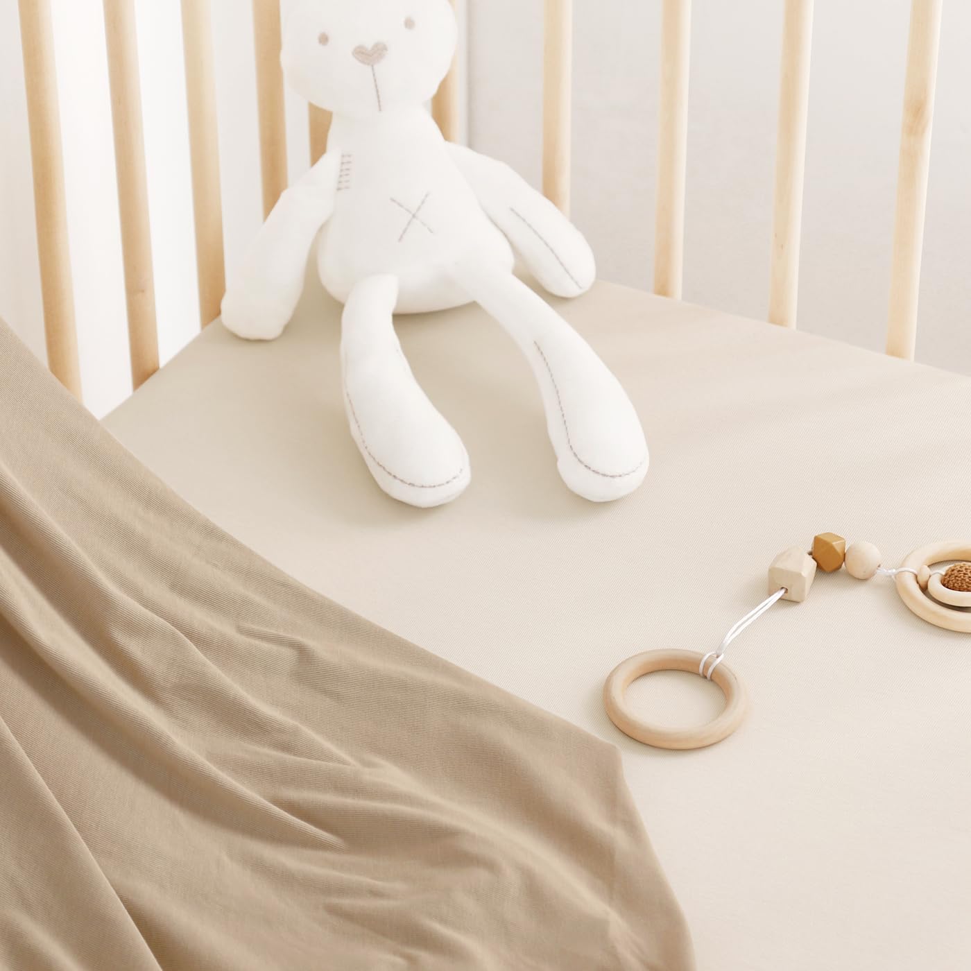GRSSDER ultra-soft jersey crib sheet offers breathable comfort for naps and bedtime.